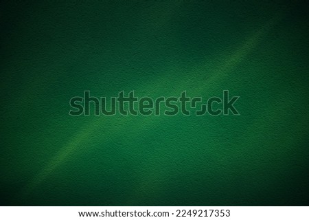 Backdrop for Irish St. Patrick Day. Elegant dark green background with old vintage grunge texture. St Patrick's Day banner design. 