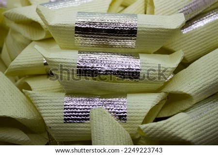 Joss paper are sheets of paper that is folded to resemble a chinese gold sycee and than burned n every chinese new year