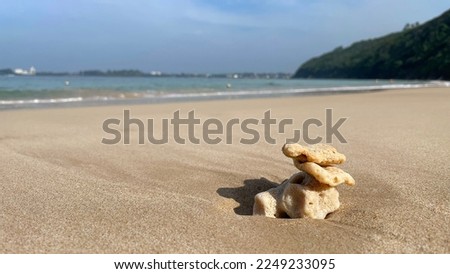 Zen seashore coral stack on a sandy Sri Lanka beach on Indian ocean