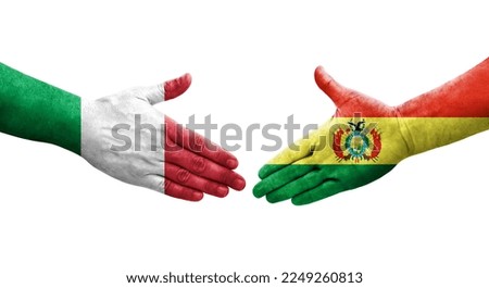 Handshake between Italy and Bolivia flags painted on hands, isolated transparent image.