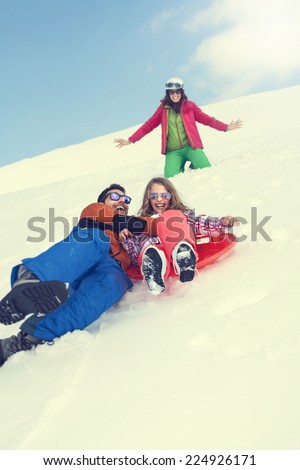 Family having fun in the snow