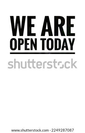 We are open today business concept on white and blurry background.
