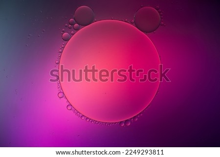 Colorful artistic of oil drop floating on the water. Abstract bubble background.