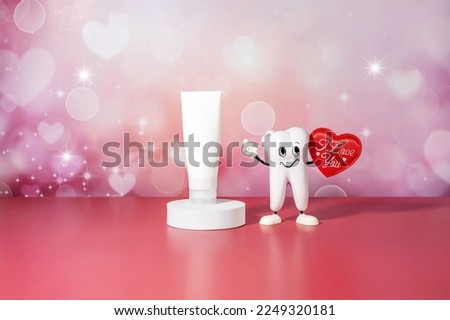 cartoon model of a tooth with a heart in his hands and toothpaste on the podium on an abstract background of hearts
