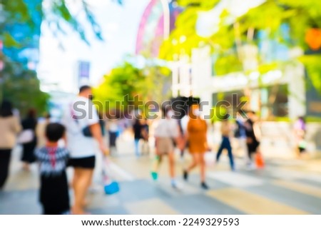 Blurred People walking in siam square ,Siam square is a Famous shopping and popular among teen.