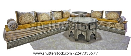 Large moroccan couch with cushions and ornated table isolated on white with clipping path Royalty-Free Stock Photo #2249335579