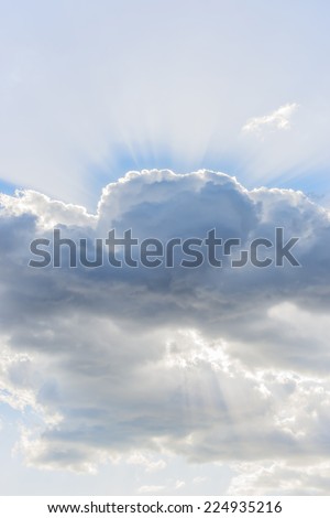 Picture of dramatic cloud with sunbeams in the sky