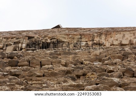 Tiled top of the pyramid of Khafre or of Chephren the second-tallest and second-largest of the 3 Ancient Egyptian Pyramids of Giza and the tomb of the Fourth-Dynasty pharaoh Khafre (Chefren) Royalty-Free Stock Photo #2249353083