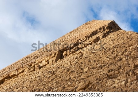 Edge of the pyramid of Khafre or of Chephren the second-tallest and second-largest of the 3 Ancient Egyptian Pyramids of Giza and the tomb of the Fourth-Dynasty pharaoh Khafre (Chefren) Royalty-Free Stock Photo #2249353085
