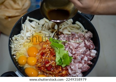 It is a picture of the ingredients in the menu called Mok Mushroom Mixed Mit.
