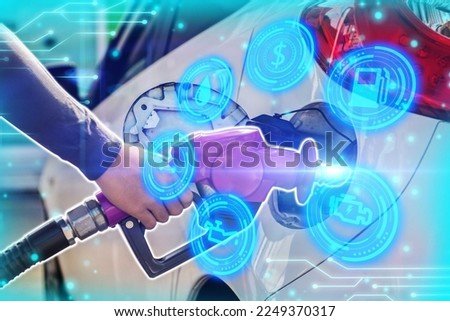Hand Man Refill and filling Oil Gas Fuel at station.Gun petrol in the tank to fill.Fuel pump at station, Futuristic oil fueling concept modern icon. Royalty-Free Stock Photo #2249370317