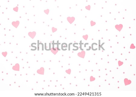 Valentine's Day background February 14th with pink hearts and confetti. Royalty-Free Stock Photo #2249421315