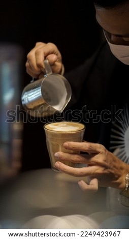 latte art. coffee based drinks. Coffee pictured with foam milk. with precise barista positioning and pretty hand gestures. you can use as an ingredient for your coffee business