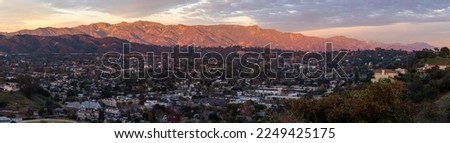 Panorama of the San Gabriel mountains lit up at sunset Royalty-Free Stock Photo #2249425175