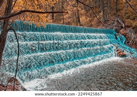 This is an interesting partial time-lapse photo of a man-made waterfall in the South Fork of the Tuolumne River, just a short distance West of the Thousand Trails Yosemite Lakes RV park. 
