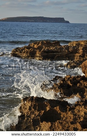 Coastline rock and water on island