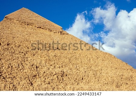 Tiled top of the pyramid of Khafre or of Chephren the second-tallest and second-largest of the 3 Ancient Egyptian Pyramids of Giza and the tomb of the Fourth-Dynasty pharaoh Khafre (Chefren) Royalty-Free Stock Photo #2249433147