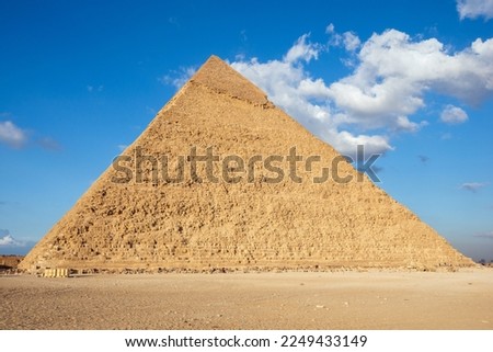 the pyramid of Khafre or of Chephren the second-tallest and second-largest of the 3 Ancient Egyptian Pyramids of Giza and the tomb of the Fourth-Dynasty pharaoh Royalty-Free Stock Photo #2249433149