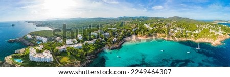 Cala Llenya in Ibiza with turquoise water in Balearic Royalty-Free Stock Photo #2249464307