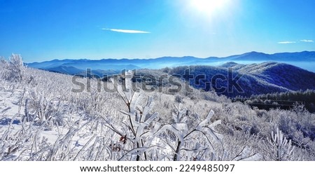 Blue Ridge Mountains in Snow.
Spectacular view at Max Patch, North Carolina and Tennessee. Asheville. Great Smoky Mountains. Appalachian trails. Royalty-Free Stock Photo #2249485097