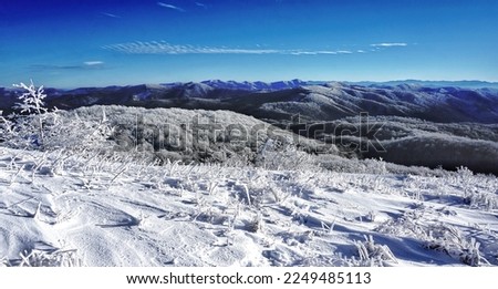Blue Ridge Mountains in Snow.
Spectacular view at Max Patch, North Carolina and Tennessee. Asheville. Great Smoky Mountains. Appalachian trails.