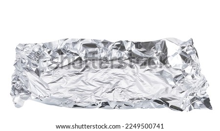 Small pieces of crumpled aluminum foils isolated on a white background. Royalty-Free Stock Photo #2249500741