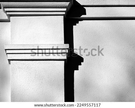 Details of the facade with chiaroscuro. The contrast of light and shadow on the facade. Royalty-Free Stock Photo #2249557117