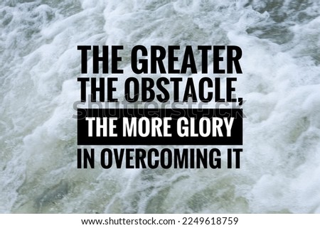 Inspirational life quote on blurry background. The greater the obstacle, the more glory in overcoming it.