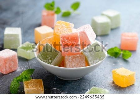 Turkish delights in white bowl. Sweets food. Royalty-Free Stock Photo #2249635435
