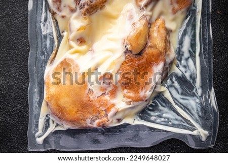 duck leg confit semi-finished product prepack ready to cook healthy meal food snack on the table copy space food background rustic top view Royalty-Free Stock Photo #2249648027