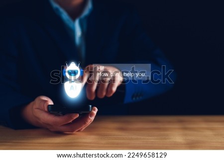ChatGPT Chat concept AI, Artificial Intelligence. businessman using technology smart robot AI, enter command prompt, contact for business information analysis, Futuristic technology transformation. Royalty-Free Stock Photo #2249658129