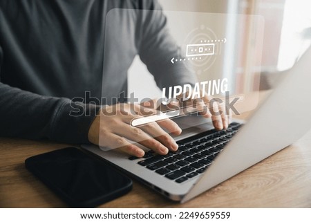 The concept of upgrading the operating system with the latest version, better system software updates, digital software development, data upgrades and future operating system updates. Royalty-Free Stock Photo #2249659559