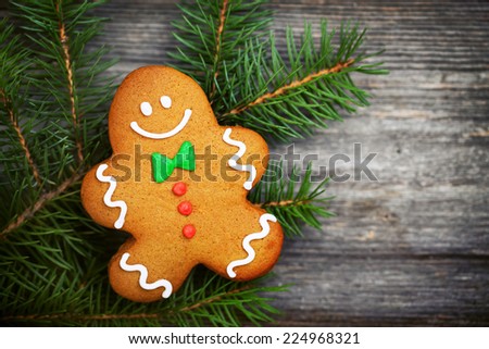 Gingerbread man over fir tree 