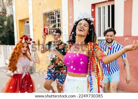Brazilian Carnival. Group of friends celebrating carnival party Royalty-Free Stock Photo #2249730385