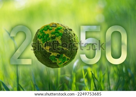 Numbers 2050 with green planet. A symbol of sustainable development and full transition to renewable energy by 2050 year. Royalty-Free Stock Photo #2249753685