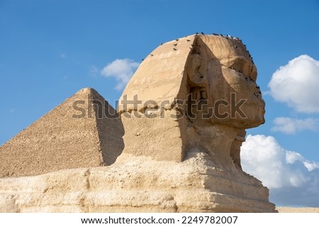 The Great Sphinx and The Great Pyramid of Giza - the biggest Egyptian pyramid and the tomb of Fourth Dynasty pharaoh Khufu. Royalty-Free Stock Photo #2249782007