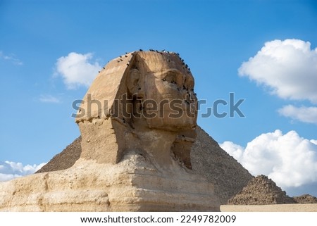 The Great Sphinx and The Great Pyramid of Giza - the biggest Egyptian pyramid and the tomb of Fourth Dynasty pharaoh Khufu. Royalty-Free Stock Photo #2249782009