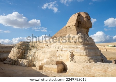 The Great Sphinx and The Great Pyramid of Giza - the biggest Egyptian pyramid and the tomb of Fourth Dynasty pharaoh Khufu. Royalty-Free Stock Photo #2249782013