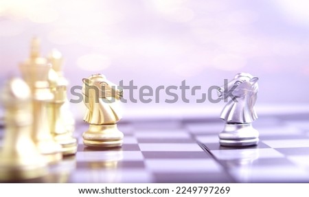 Business competition refers to companies or organizations striving to be the best in their industry by offering superior products services and outperforming rivals.Horse chess fight on bord. Royalty-Free Stock Photo #2249797269