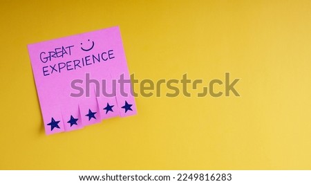 Customer Experiences Concept. Happy Client Rate Five Star and Smiling Face on Satisfaction Surveys Note. Positive Feedback and Review Royalty-Free Stock Photo #2249816283
