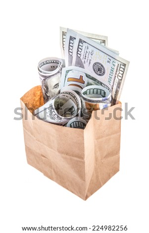 American money, banknotes in paper shopping bags with copy space on white background or surface. money or currency concept photo. shopping bags full of with banknotes as a gift or present