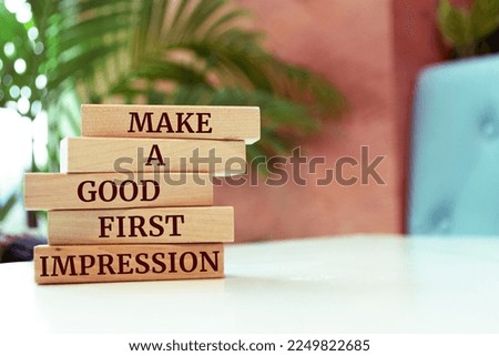 Wooden blocks with words 'Make a Good First Impression'. Royalty-Free Stock Photo #2249822685