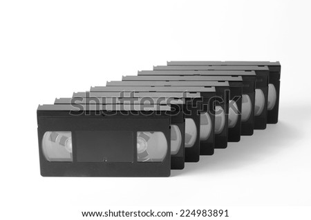 Old, obsolete video cassette vhs on a white background.
