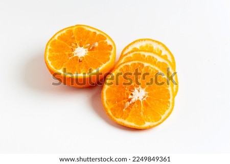 An isolated image of orange slices on a white background.