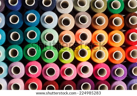 Sewing threads as a multicolored background close up Royalty-Free Stock Photo #224985283