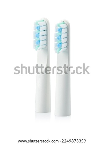 Replacement heads for a sonic electric toothbrush. Set of two. White background. Isolated.