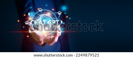 Businessman holding hologram Chat GPT virtual icon on smartphone intelligence Ai, Chat GPT Chat with AI Artificial Intelligence, Futuristic technology, robot in online system. Royalty-Free Stock Photo #2249879521