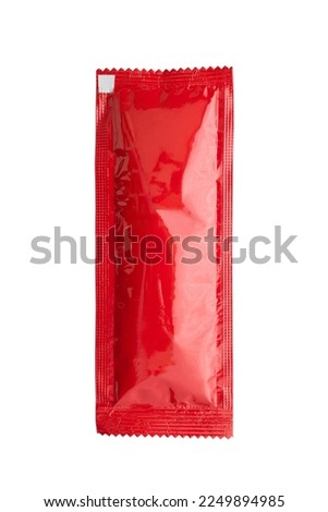 Blank red foil tomato ketchup sauce sachet package isolated on white background Royalty-Free Stock Photo #2249894985