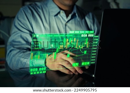 businessman use computer for investing in stock market technology Royalty-Free Stock Photo #2249905795