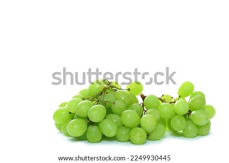 bunch of white grapes sitting on a table with white background no people stock photo